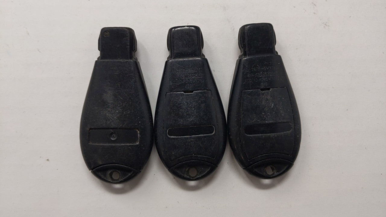 Lot of 3 Aftermarket Keyless Entry Remote Fob MIXED FCC IDS MIXED PART - Oemusedautoparts1.com