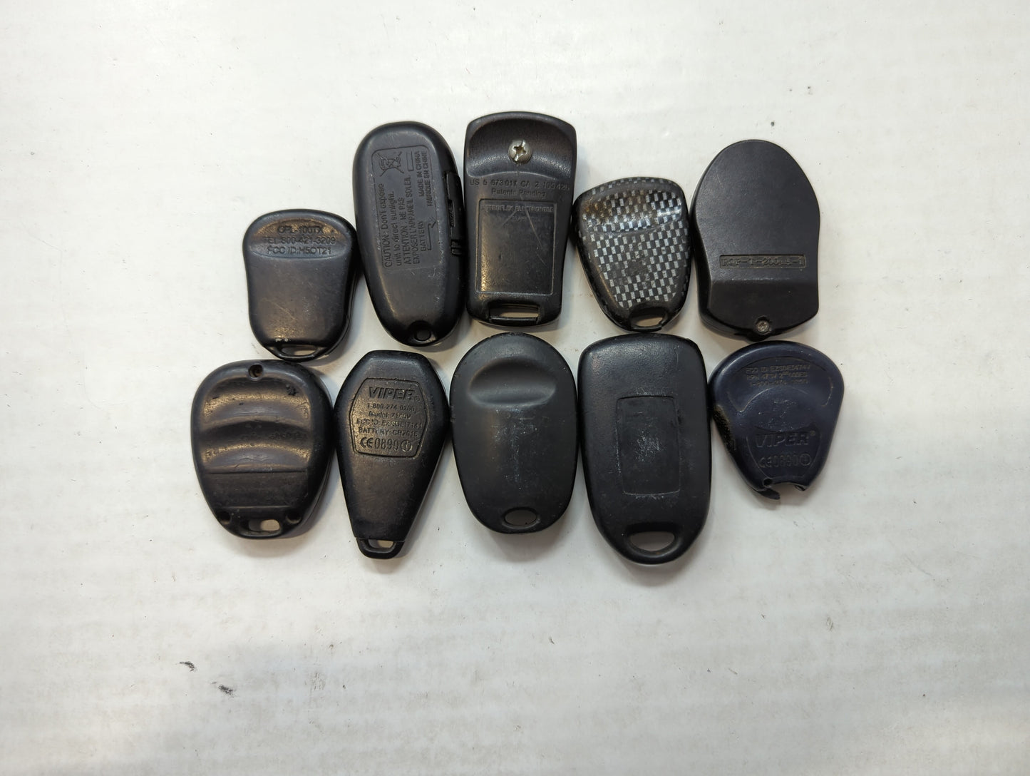 Lot of 10 Aftermarket Keyless Entry Remote Fob MIXED FCC IDS MIXED PART - Oemusedautoparts1.com