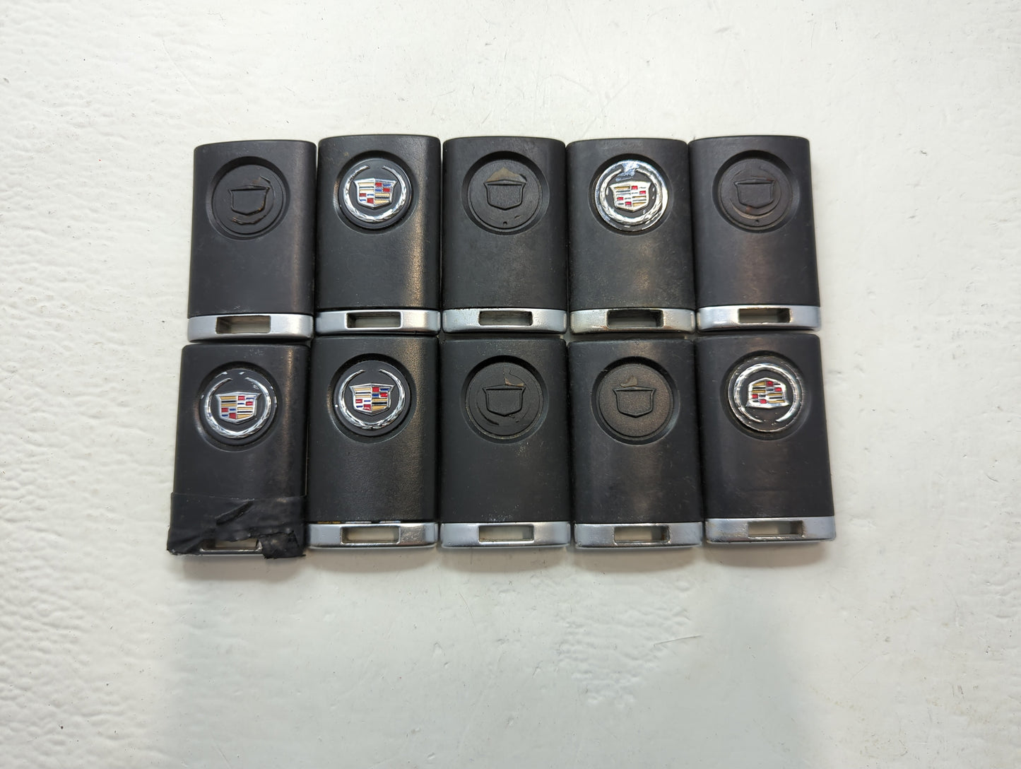 Lot of 10 Cadillac Keyless Entry Remote Fob MIXED FCC IDS MIXED PART - Oemusedautoparts1.com