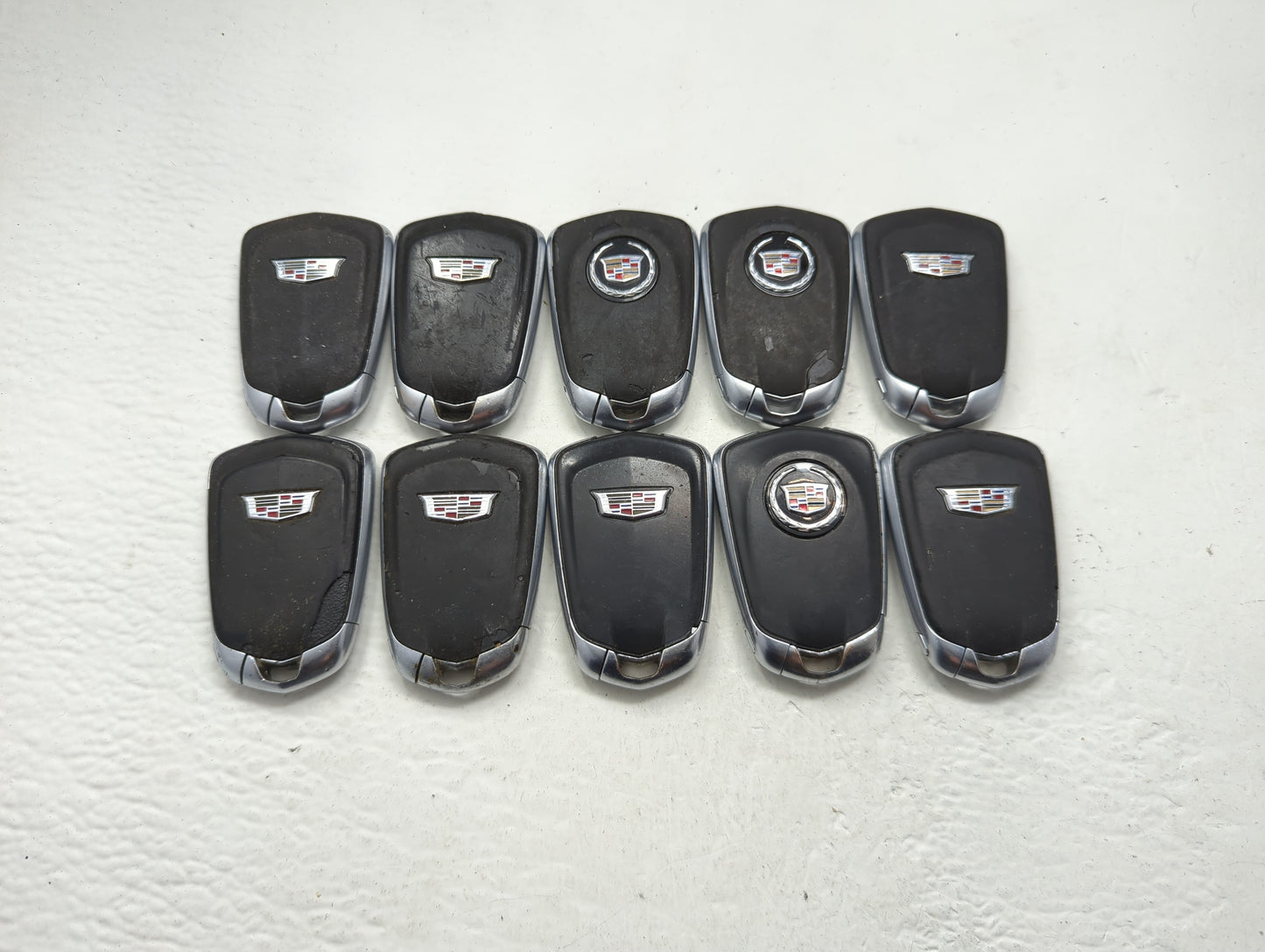 Lot of 10 Cadillac Keyless Entry Remote Fob MIXED FCC IDS MIXED PART - Oemusedautoparts1.com