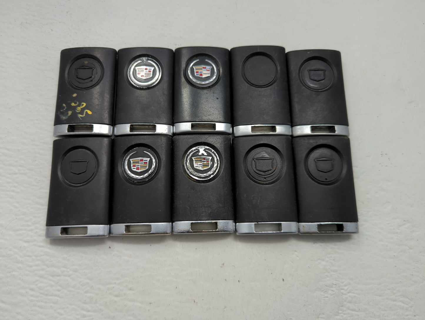Lot of 10 Cadillac Keyless Entry Remote Fob MIXED FCC IDS MIXED PART - Oemusedautoparts1.com