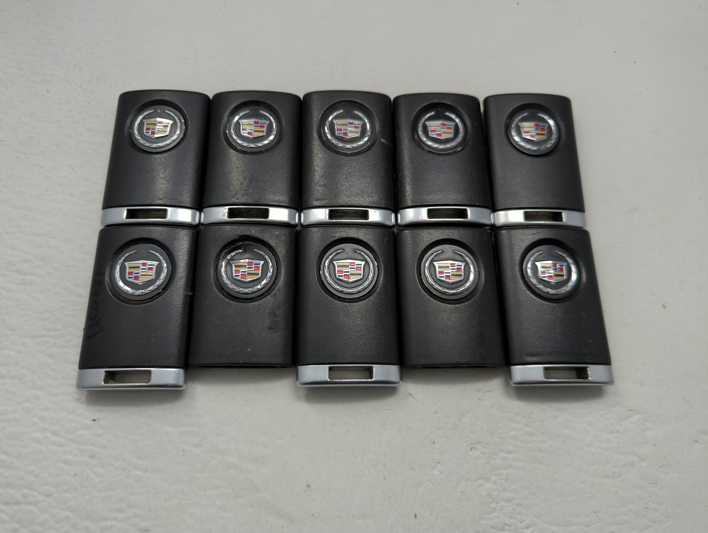 Lot of 10 Cadillac Keyless Entry Remote Fob OUC6000066 | OUC6000223 - Oemusedautoparts1.com
