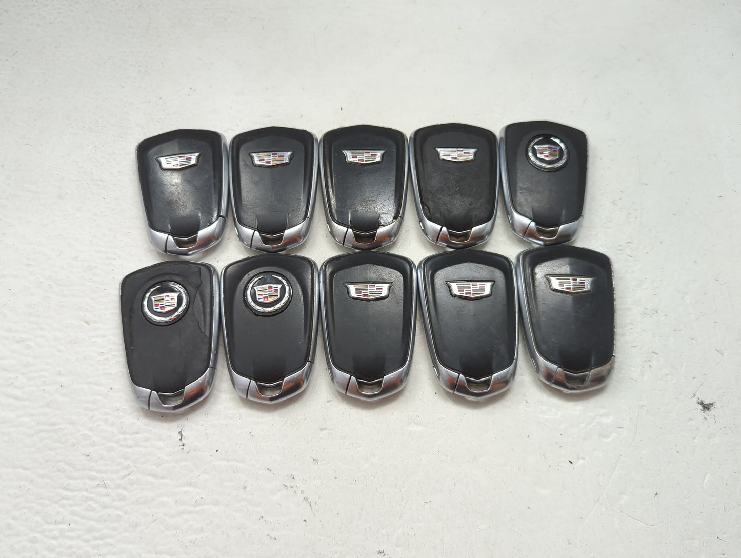 Lot of 10 Cadillac Keyless Entry Remote Fob MIXED FCC IDS MIXED PART 1476180 - Oemusedautoparts1.com