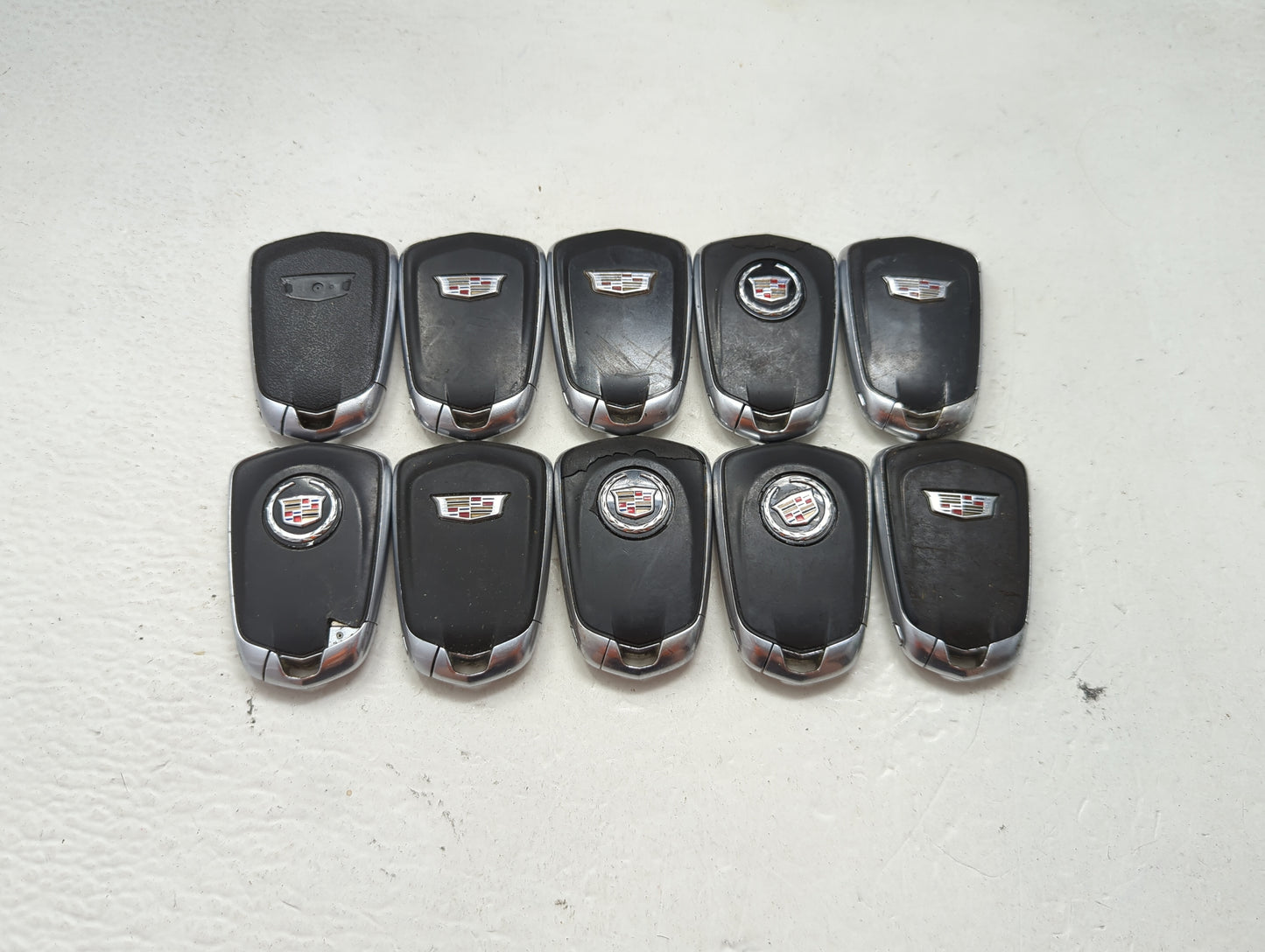 Lot of 10 Cadillac Keyless Entry Remote Fob MIXED FCC IDS MIXED PART 1476182 - Oemusedautoparts1.com