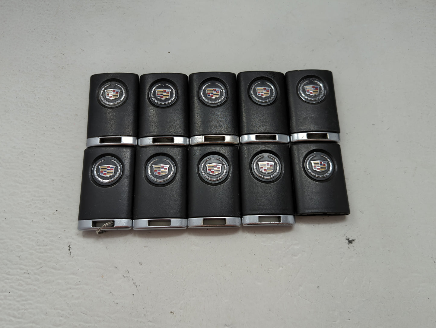 Lot of 10 Cadillac Keyless Entry Remote Fob MIXED FCC IDS MIXED PART 1476183 - Oemusedautoparts1.com