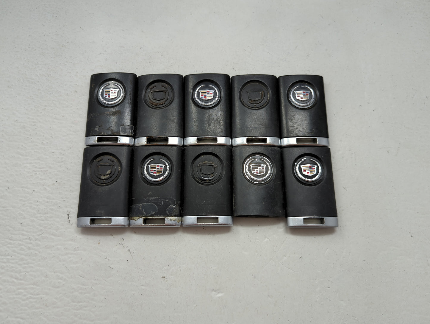 Lot of 10 Cadillac Keyless Entry Remote Fob MIXED FCC IDS MIXED PART 1476196 - Oemusedautoparts1.com