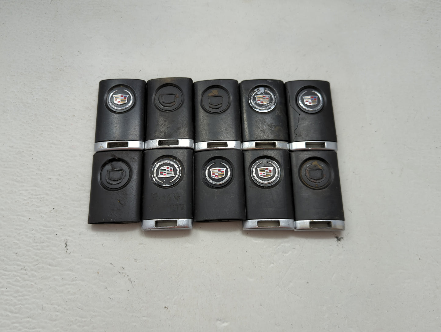 Lot of 10 Cadillac Keyless Entry Remote Fob MIXED FCC IDS MIXED PART 1476199 - Oemusedautoparts1.com