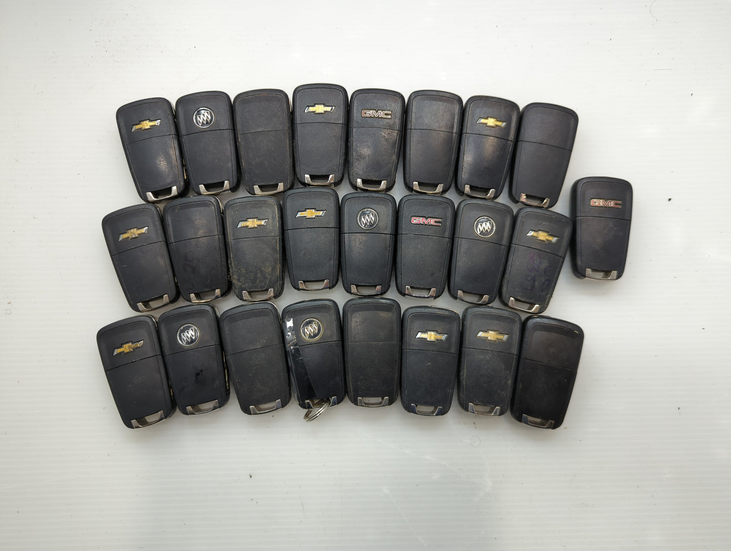 Lot of 25 Chevrolet Keyless Entry Remote Fob OHT01060512 | X32-GMHKG000 - Oemusedautoparts1.com