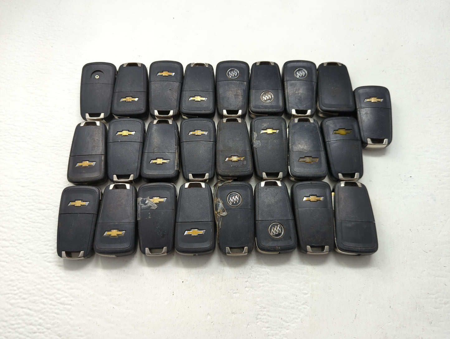 Lot of 25 Chevrolet Keyless Entry Remote Fob OHT01060512 | V2T01060512 - Oemusedautoparts1.com