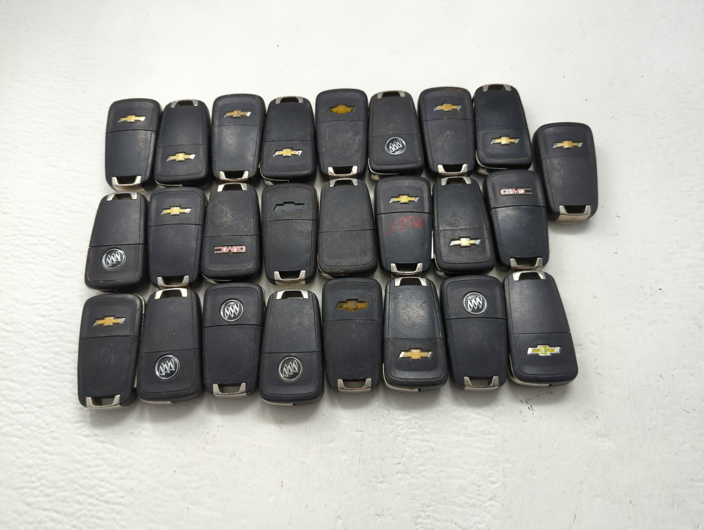 Lot of 25 Chevrolet Keyless Entry Remote Fob MIXED FCC IDS MIXED PART - Oemusedautoparts1.com
