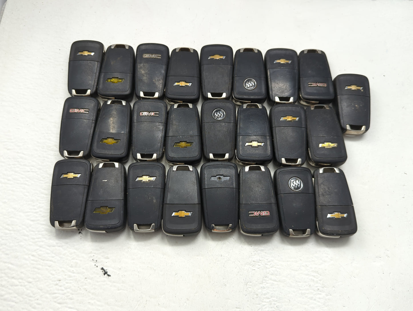 Lot of 25 Chevrolet Keyless Entry Remote Fob OHT01060512 | VT201060512 - Oemusedautoparts1.com