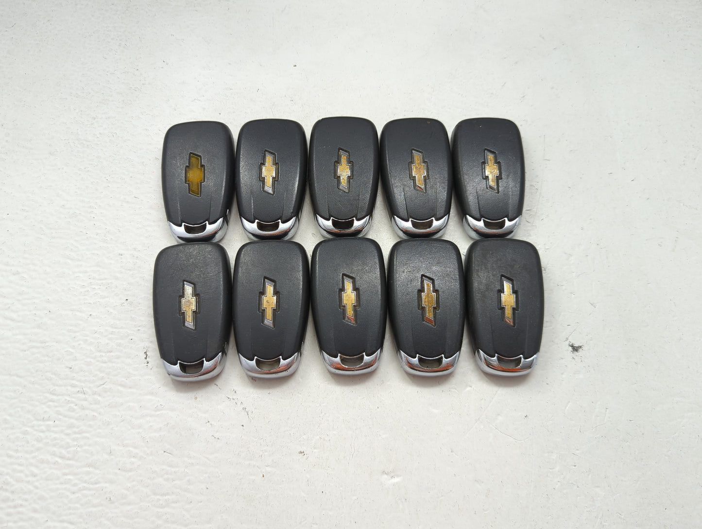 Lot of 10 Chevrolet Keyless Entry Remote Fob MIXED FCC IDS MIXED PART 1476124 - Oemusedautoparts1.com