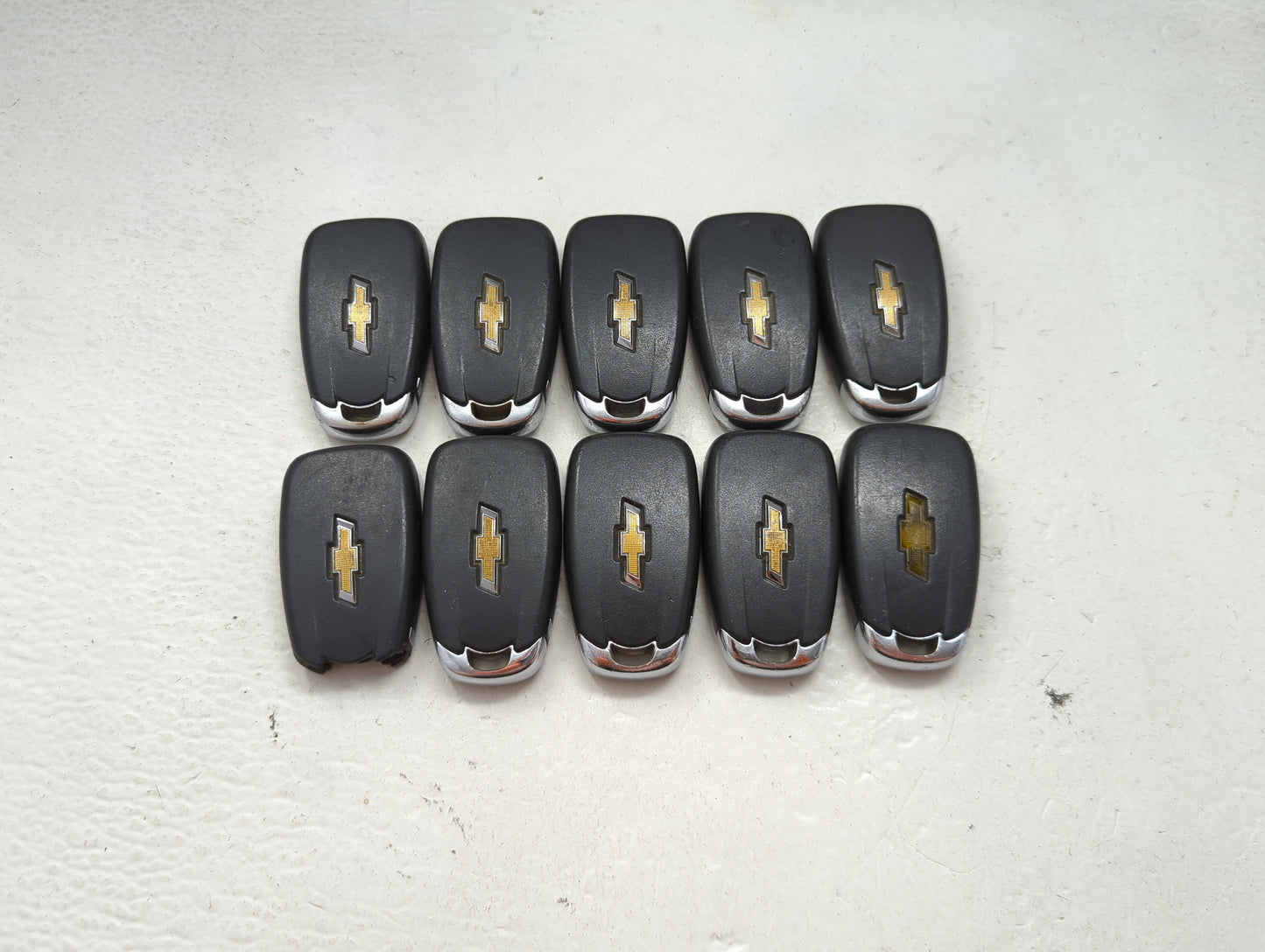 Lot of 10 Chevrolet Keyless Entry Remote Fob MIXED FCC IDS MIXED PART 1476141 - Oemusedautoparts1.com