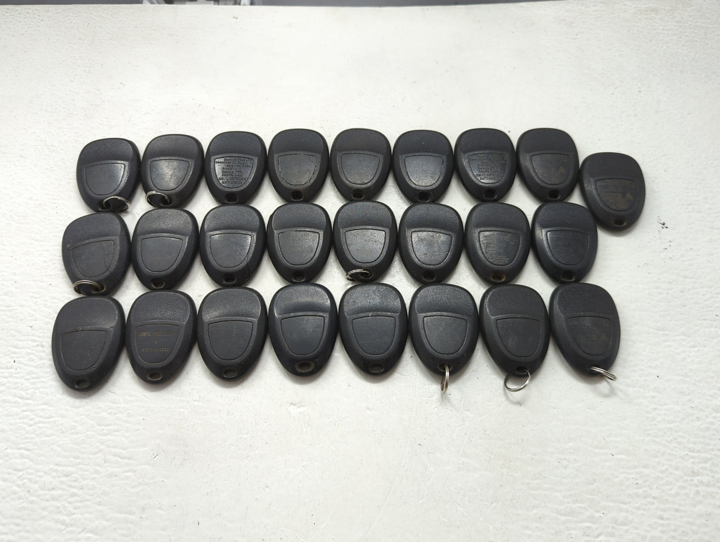 Lot of 25 Chevrolet Keyless Entry Remote Fob MIXED FCC IDS MIXED PART 1476703 - Oemusedautoparts1.com