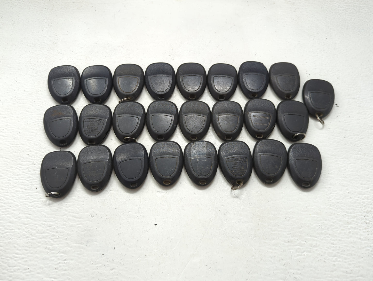 Lot of 25 Chevrolet Keyless Entry Remote Fob MIXED FCC IDS MIXED PART 1476708 - Oemusedautoparts1.com