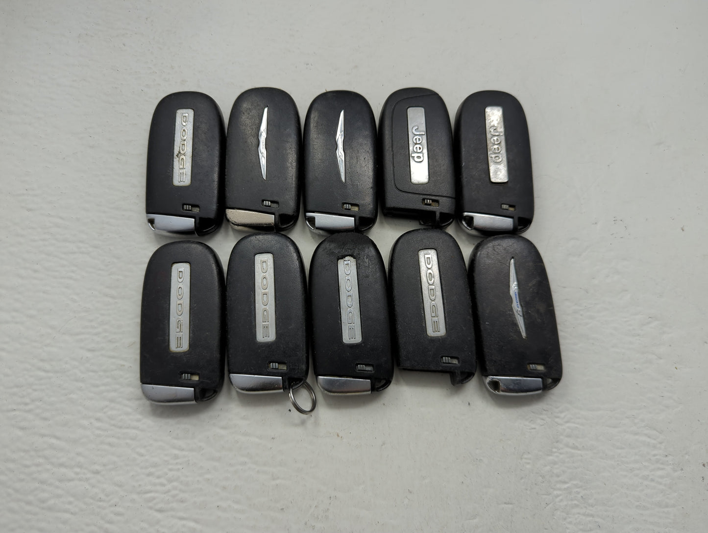 Lot of 10 Dodge Keyless Entry Remote Fob MIXED FCC IDS MIXED PART - Oemusedautoparts1.com