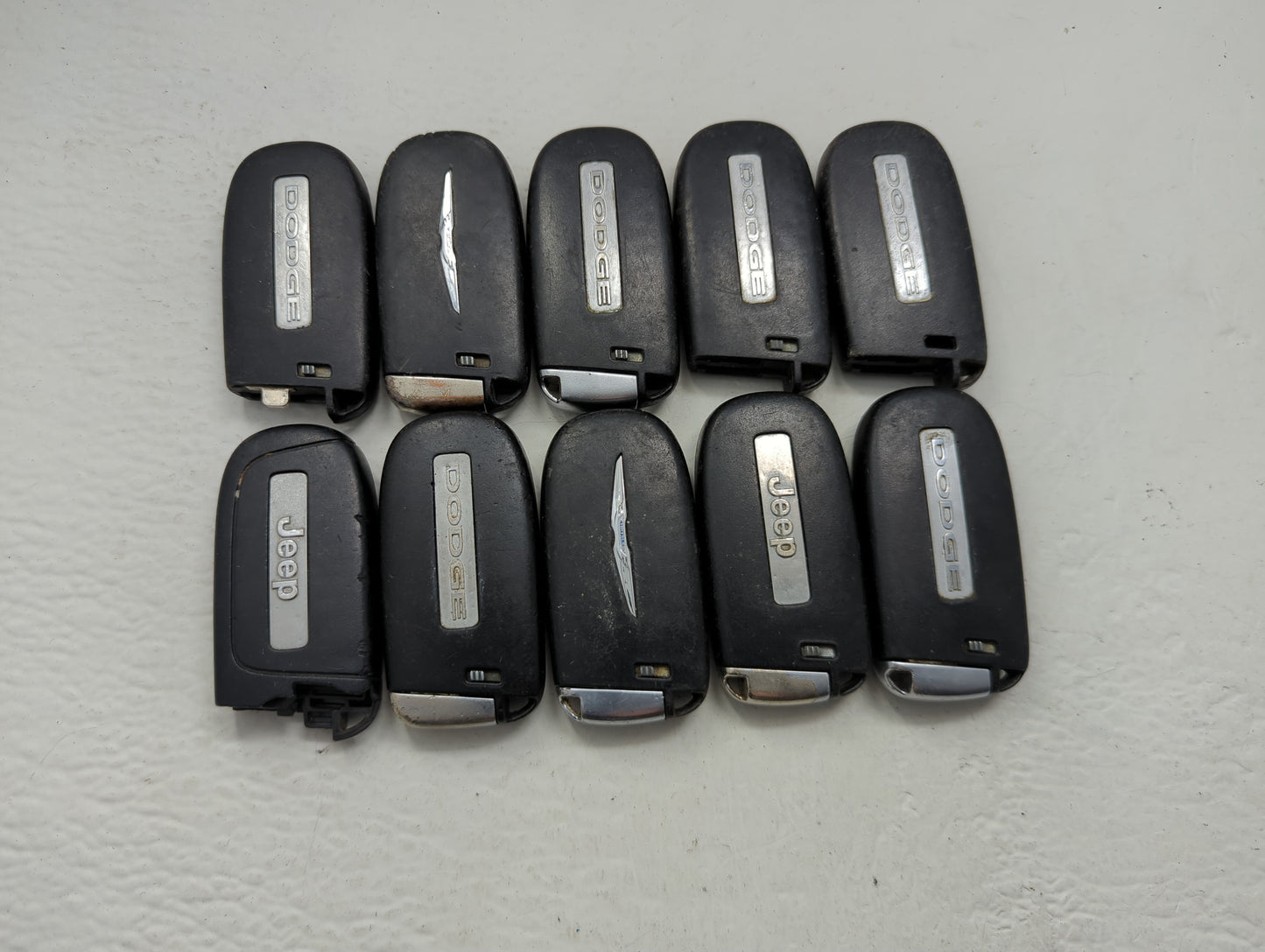 Lot of 10 Dodge Keyless Entry Remote Fob MIXED FCC IDS MIXED PART - Oemusedautoparts1.com