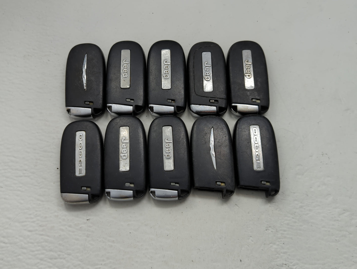 Lot of 10 Dodge Keyless Entry Remote Fob MIXED FCC IDS MIXED PART - Oemusedautoparts1.com