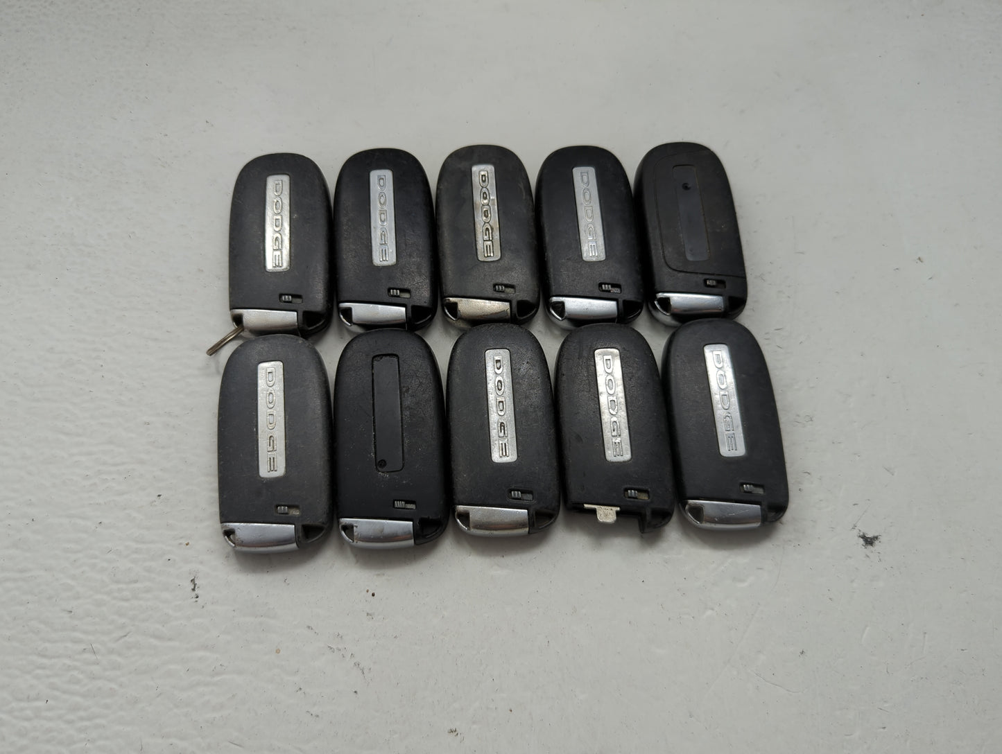 Lot of 10 Dodge Keyless Entry Remote Fob MIXED FCC IDS MIXED PART 1475803 - Oemusedautoparts1.com