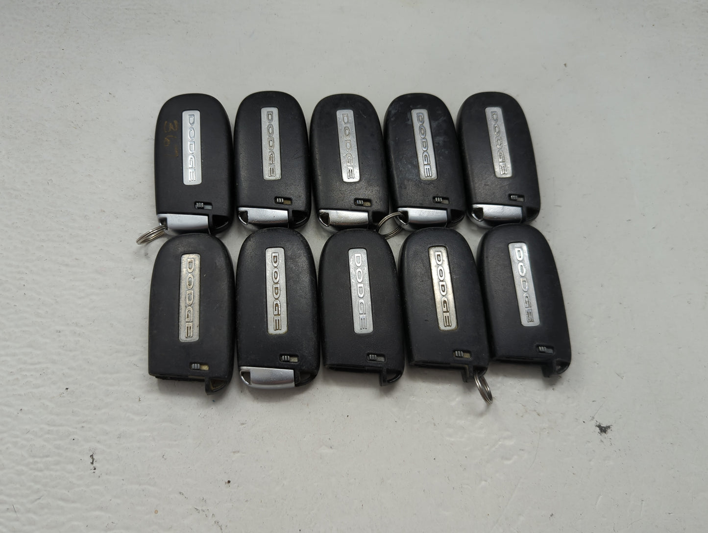 Lot of 10 Dodge Keyless Entry Remote Fob MIXED FCC IDS MIXED PART 1475817 - Oemusedautoparts1.com
