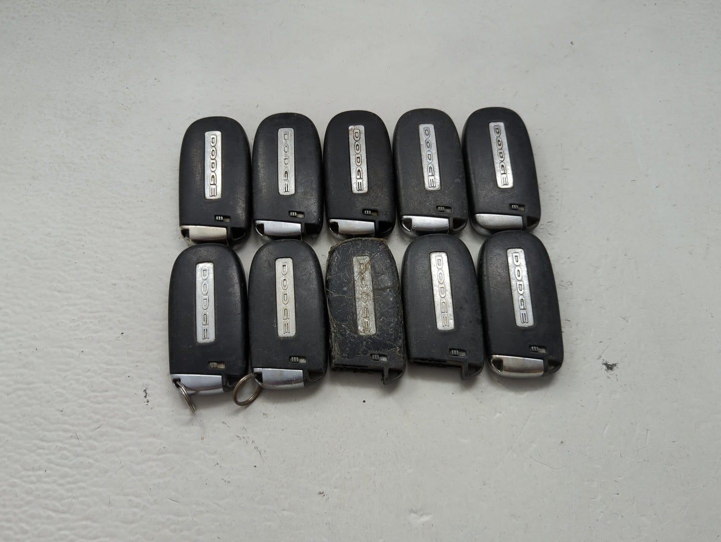 Lot of 10 Dodge Keyless Entry Remote Fob MIXED FCC IDS MIXED PART 1475818 - Oemusedautoparts1.com
