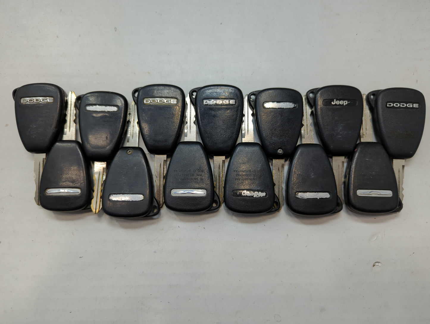 Lot of 15 Dodge Keyless Entry Remote Fob MIXED FCC IDS MIXED PART NUMBERS - Oemusedautoparts1.com