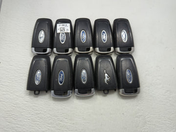 Lot of 10 Ford Keyless Entry Remote Fob MIXED FCC IDS MIXED PART NUMBERS