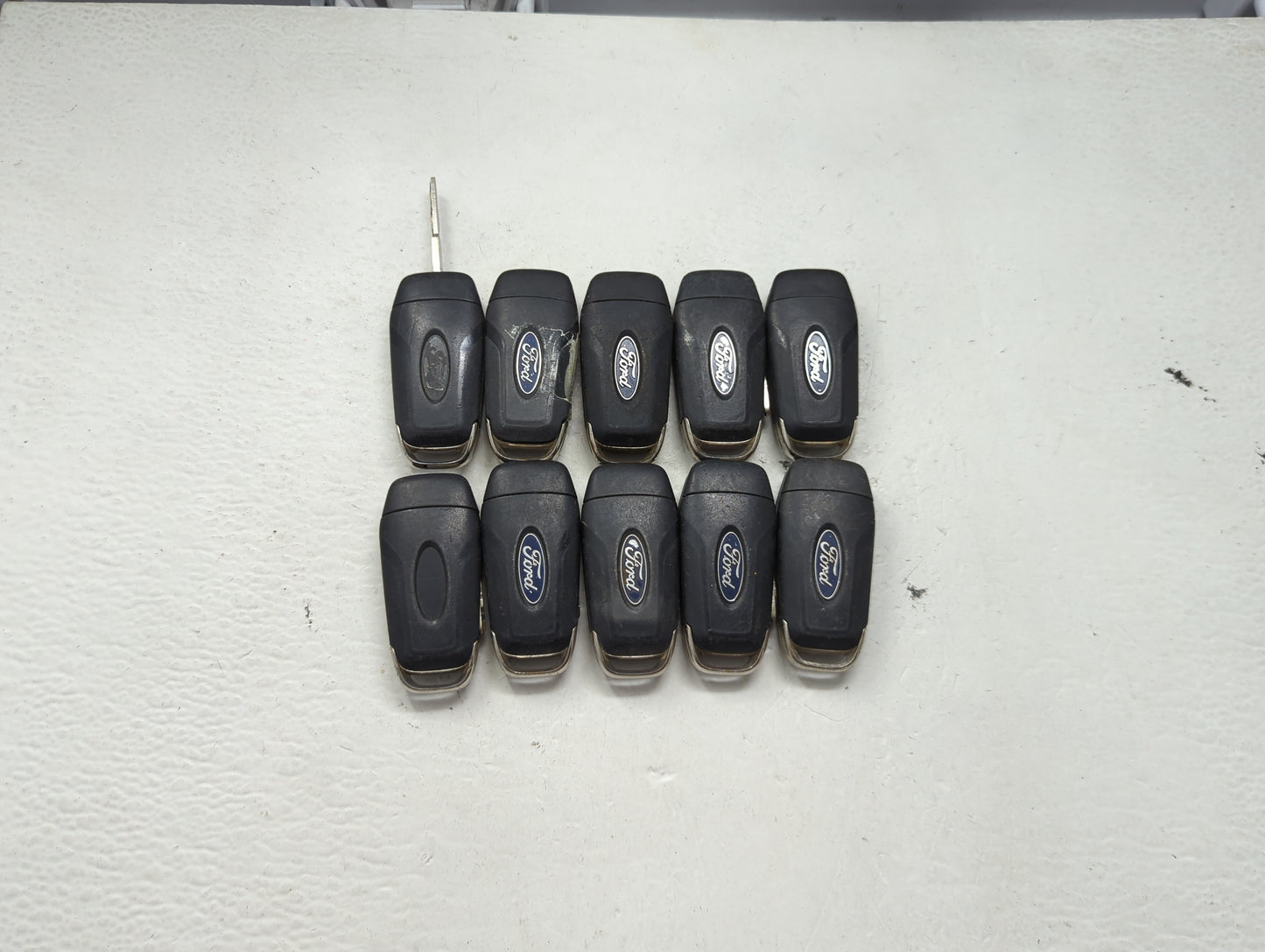 Lot of 10 Ford Keyless Entry Remote Fob MIXED FCC IDS MIXED PART NUMBERS 1476305 - Oemusedautoparts1.com