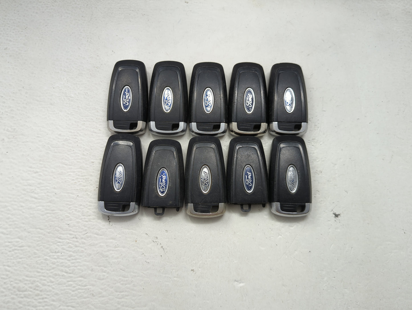 Lot of 10 Ford Keyless Entry Remote Fob MIXED FCC IDS MIXED PART NUMBERS 1476365 - Oemusedautoparts1.com