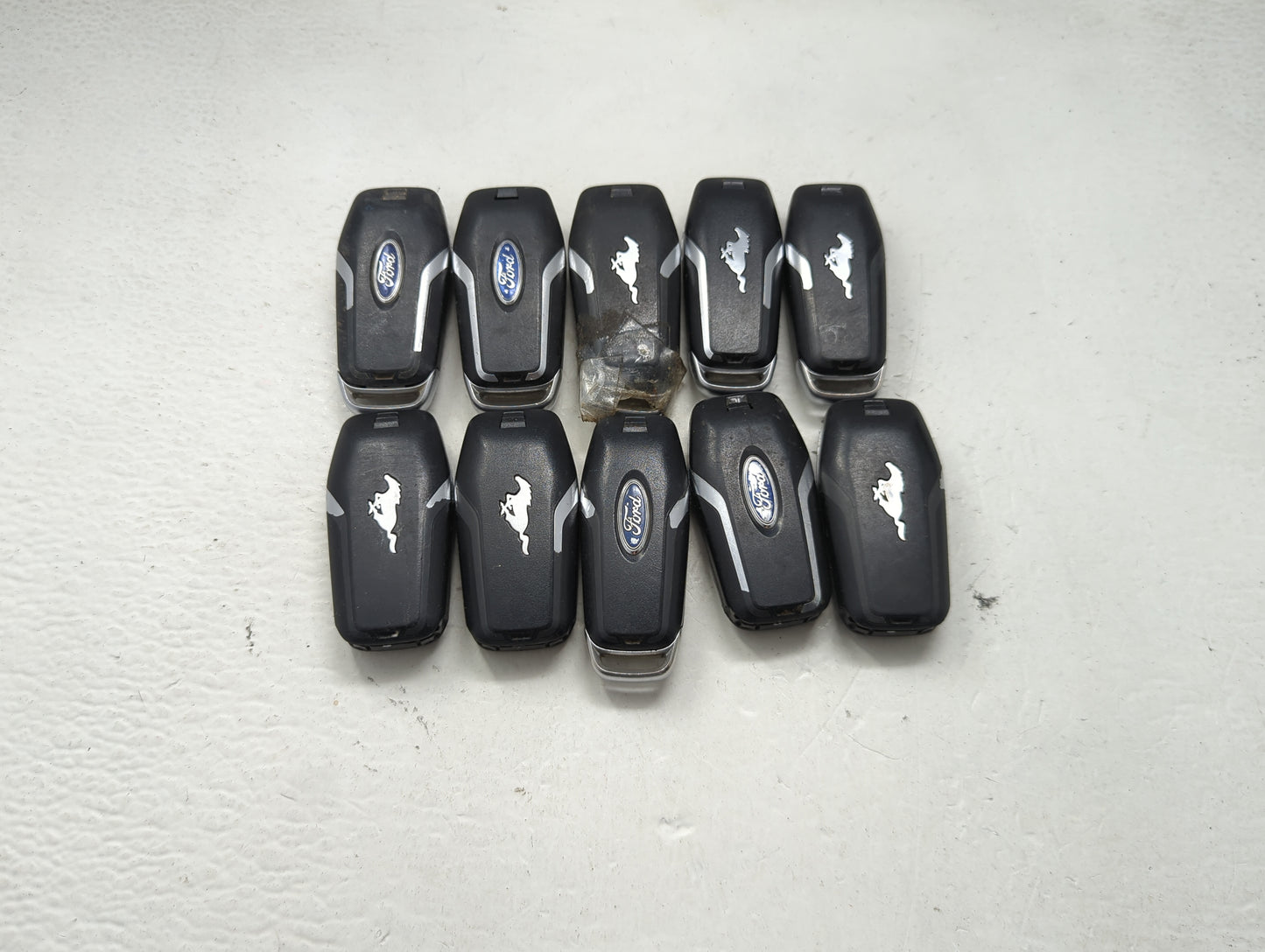 Lot of 10 Ford Keyless Entry Remote Fob MIXED FCC IDS MIXED PART NUMBERS 1476401 - Oemusedautoparts1.com