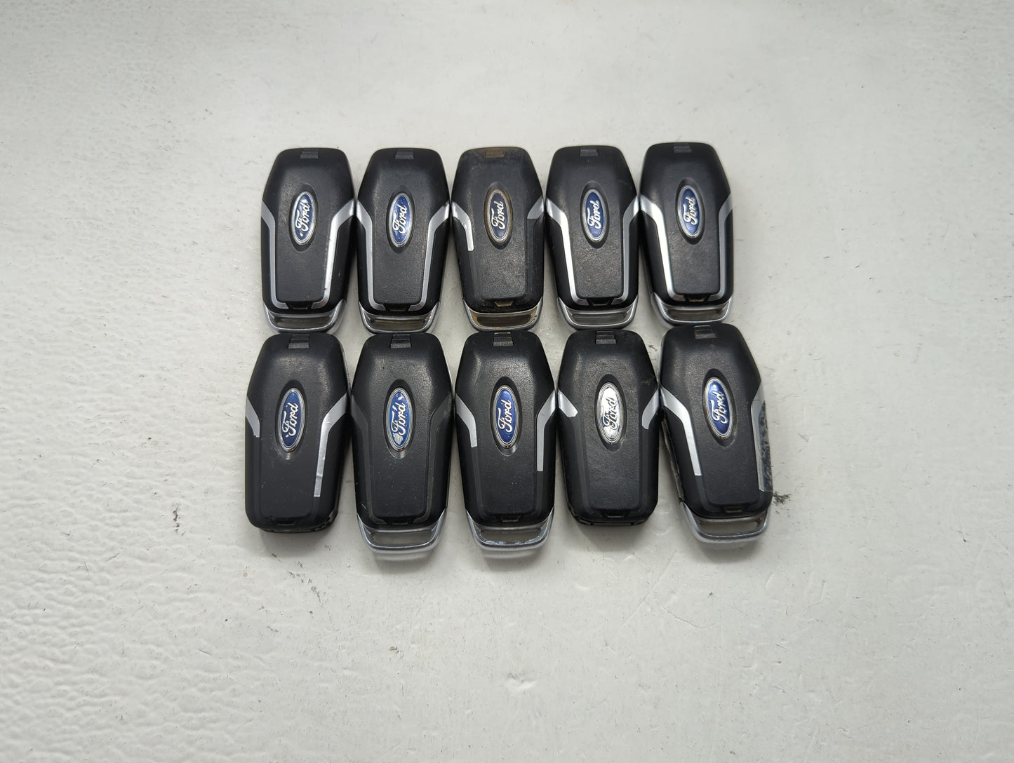 Lot of 10 Ford Keyless Entry Remote Fob MIXED FCC IDS MIXED PART NUMBERS 1476402 - Oemusedautoparts1.com