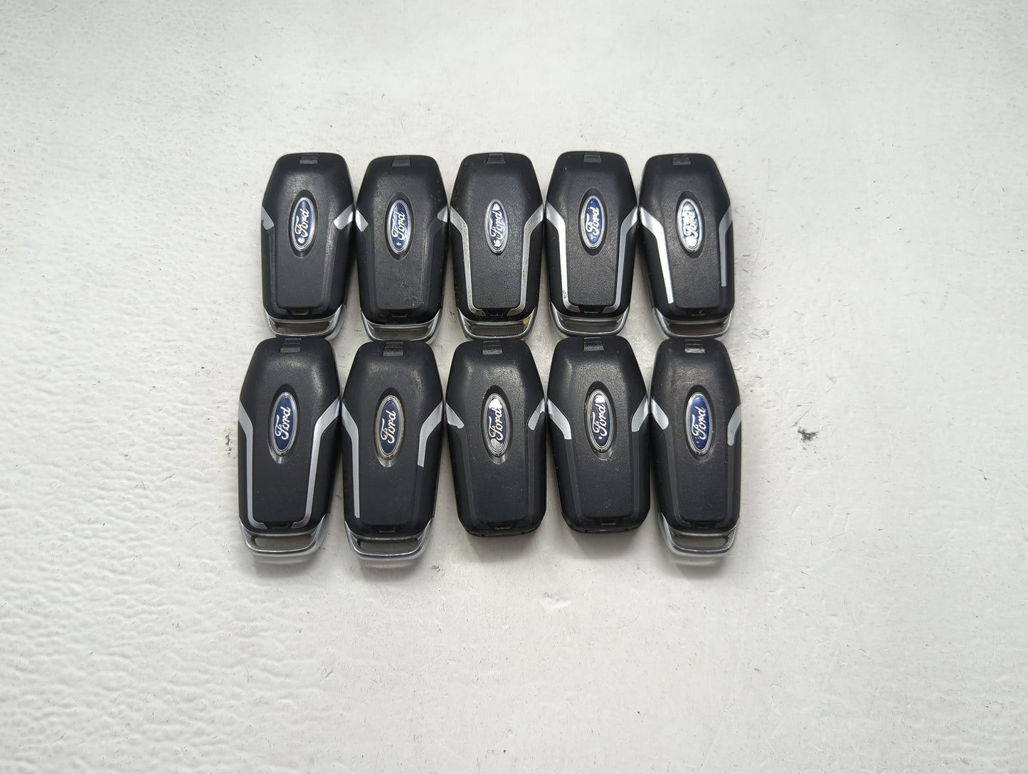 Lot of 10 Ford Keyless Entry Remote Fob MIXED FCC IDS MIXED PART NUMBERS 1476403 - Oemusedautoparts1.com