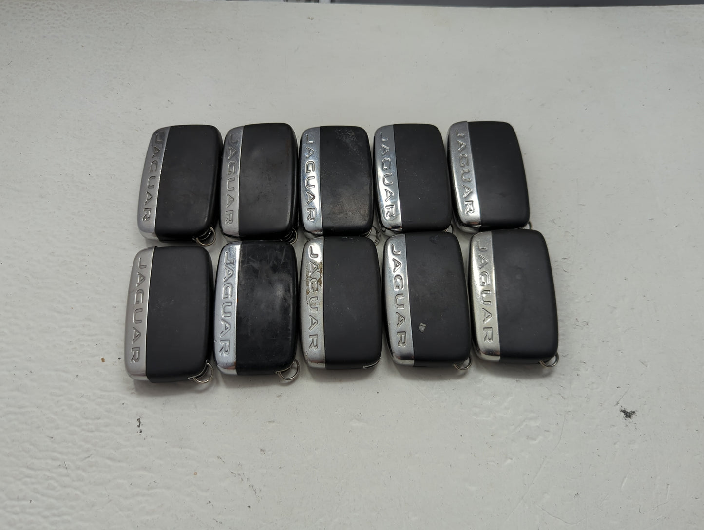 Lot of 10 Jaguar Keyless Entry Remote Fob MIXED FCC IDS MIXED PART 1474187 - Oemusedautoparts1.com