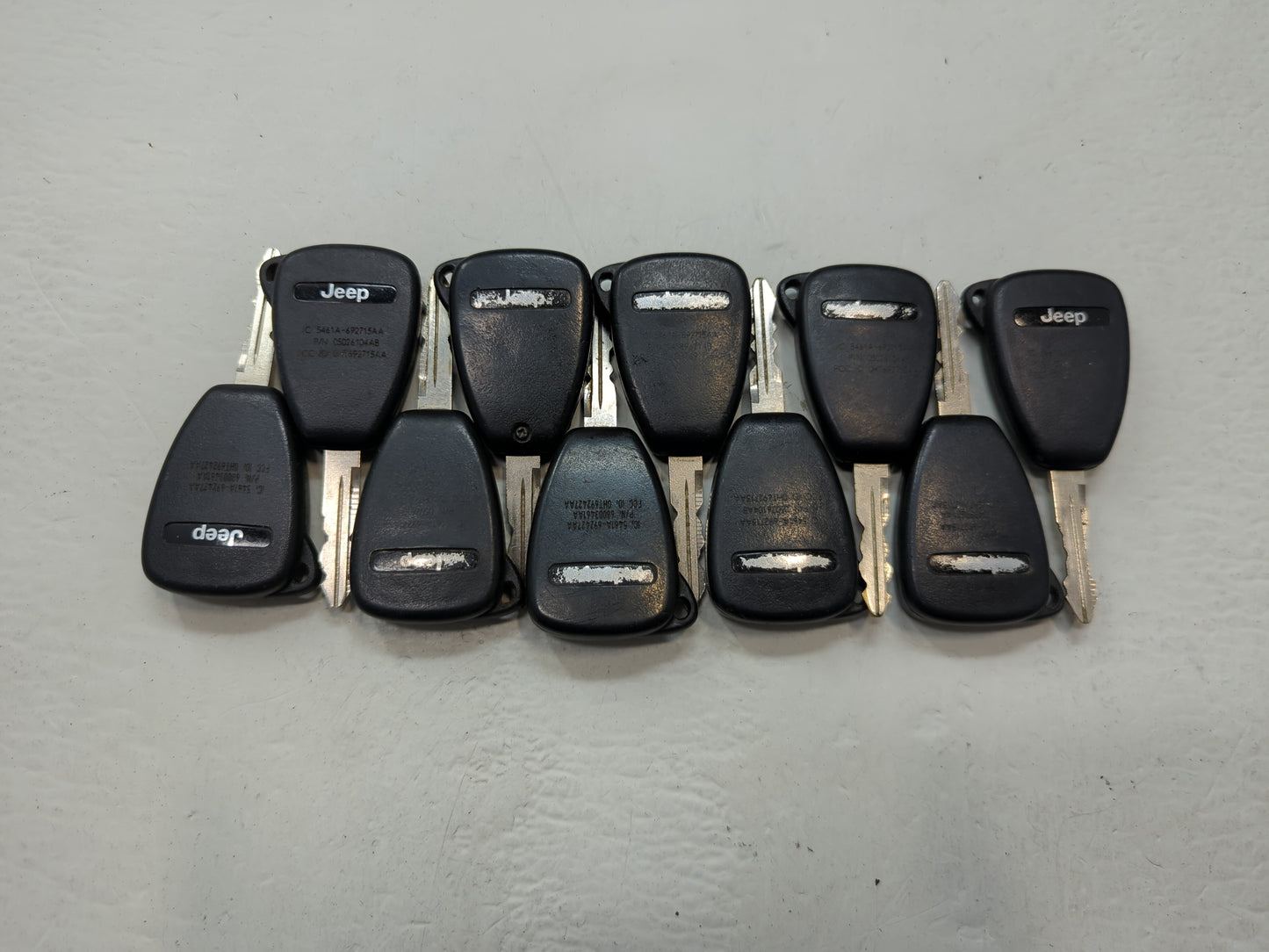 Lot of 10 Jeep Keyless Entry Remote Fob OHT691713AA | OHT692715AA | - Oemusedautoparts1.com