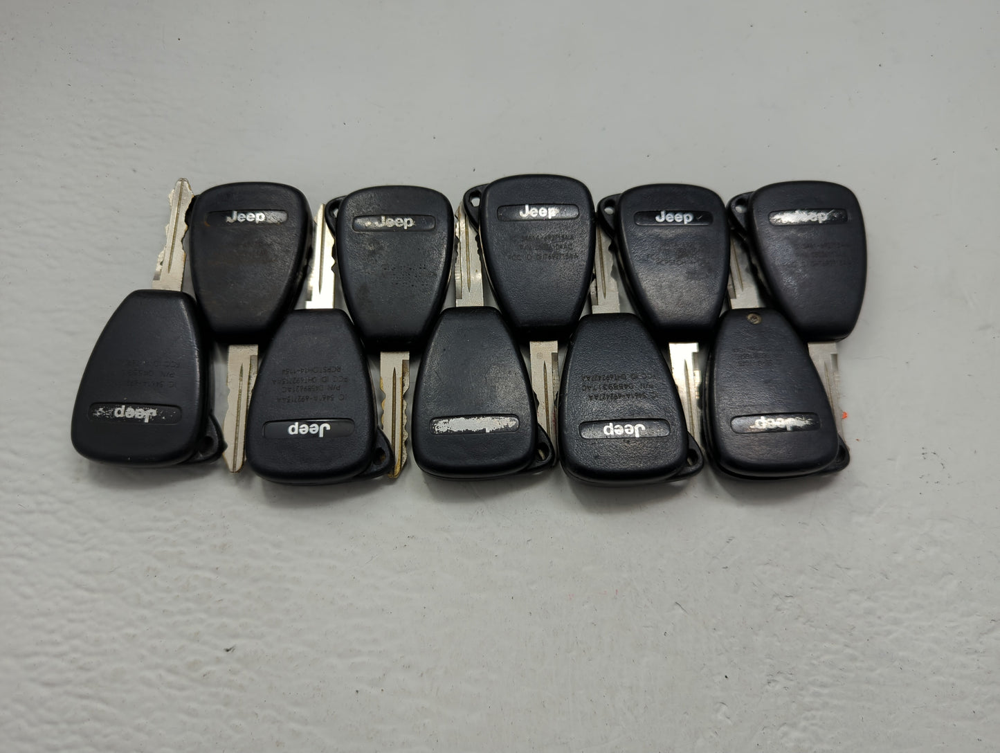 Lot of 10 Jeep Keyless Entry Remote Fob OHT691713AA | OHT692427AA | - Oemusedautoparts1.com