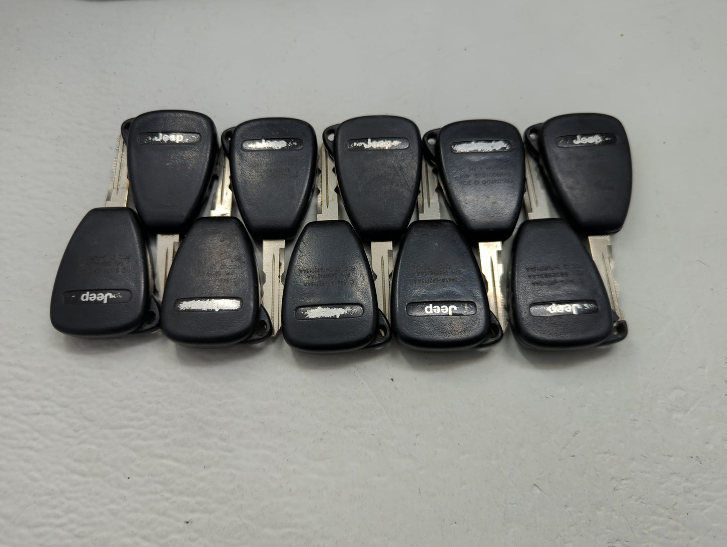 Lot of 10 Jeep Keyless Entry Remote Fob OHT692713AA MIXED PART NUMBERS - Oemusedautoparts1.com