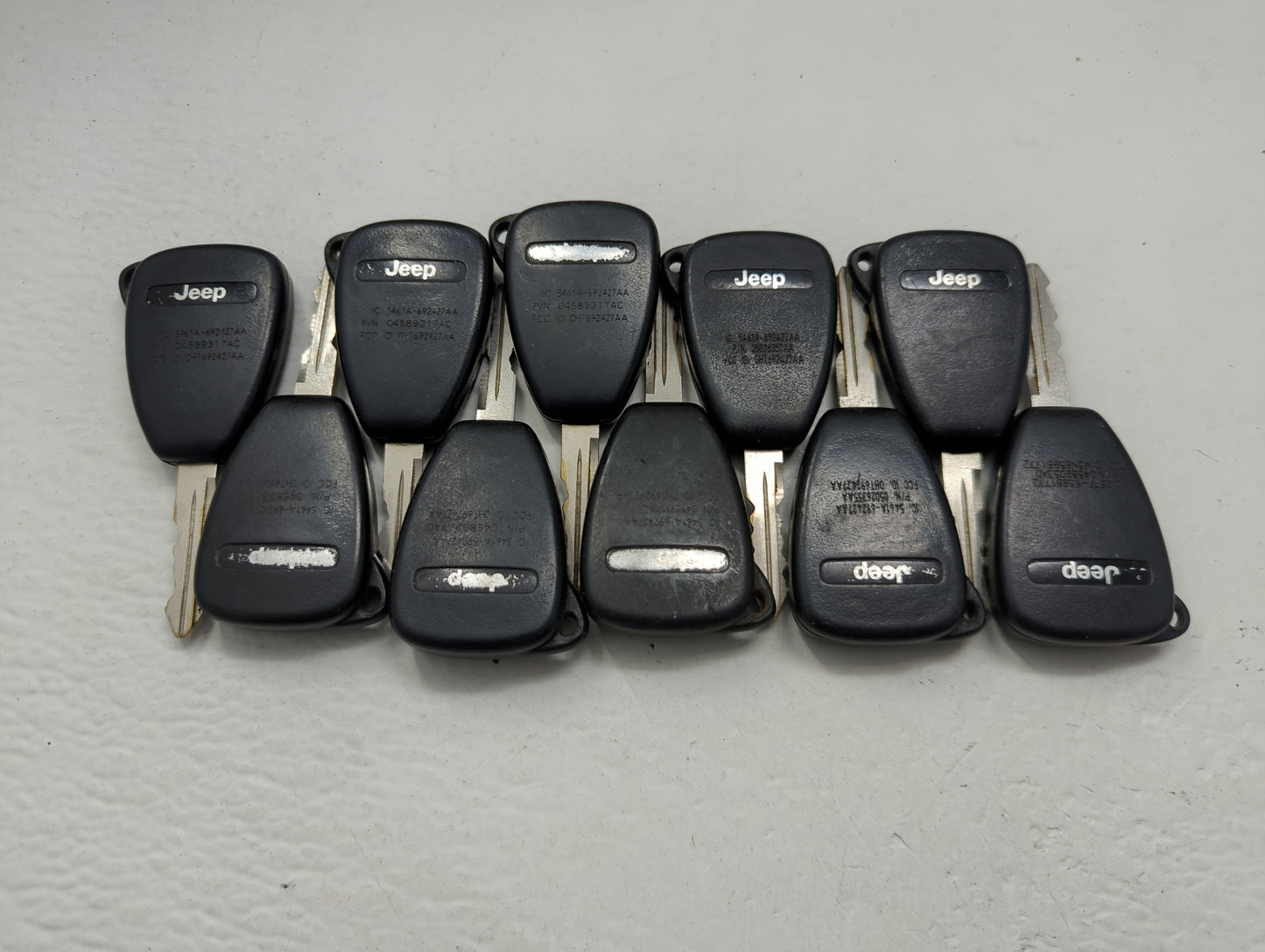 Lot of 10 Jeep Keyless Entry Remote Fob OHT692427AA | OHT692715AA | - Oemusedautoparts1.com