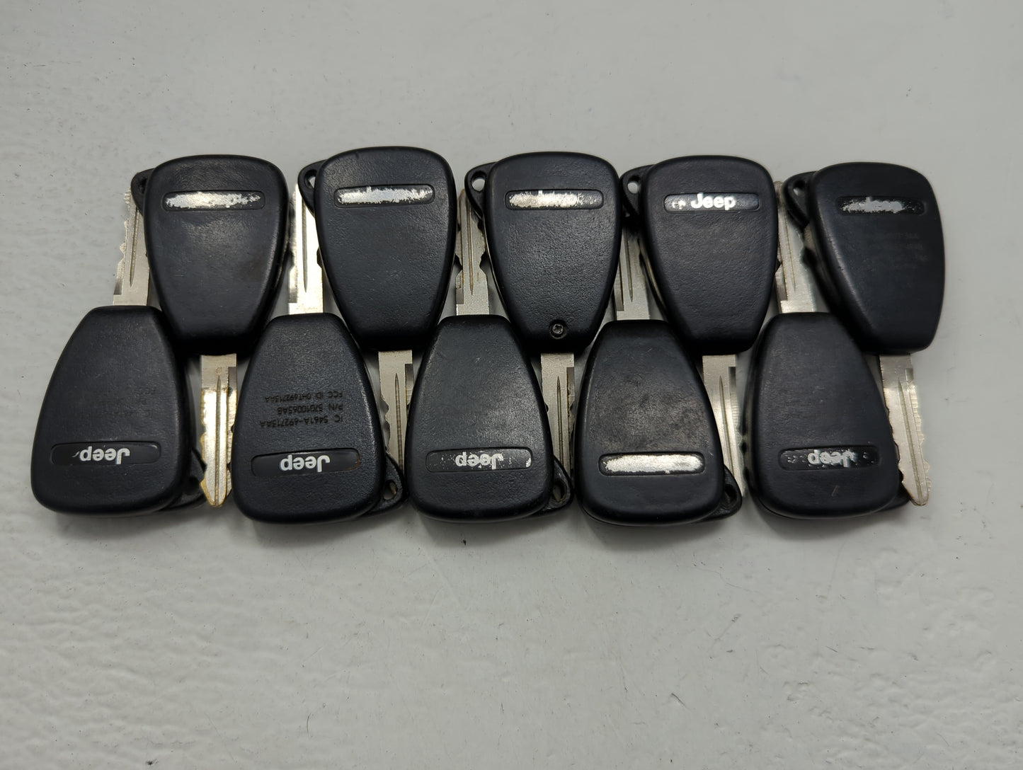 Lot of 10 Jeep Keyless Entry Remote Fob OHT691713AA | OHT691715AA | - Oemusedautoparts1.com