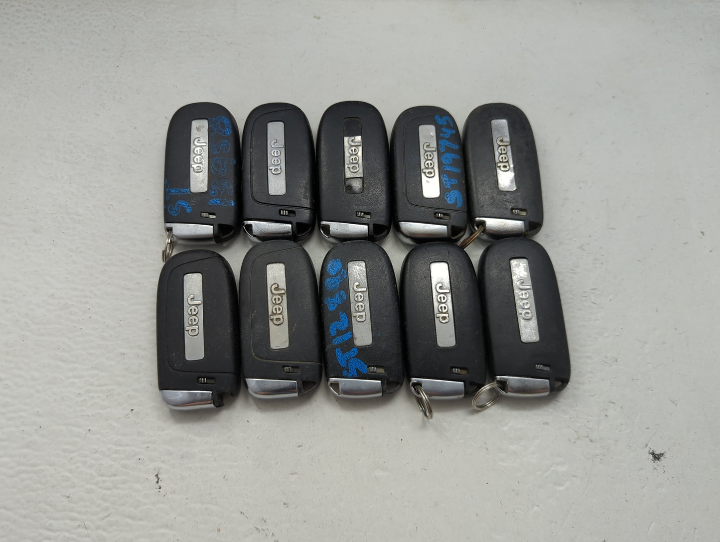 Lot of 10 Jeep Keyless Entry Remote Fob MIXED FCC IDS MIXED PART NUMBERS 1475802 - Oemusedautoparts1.com