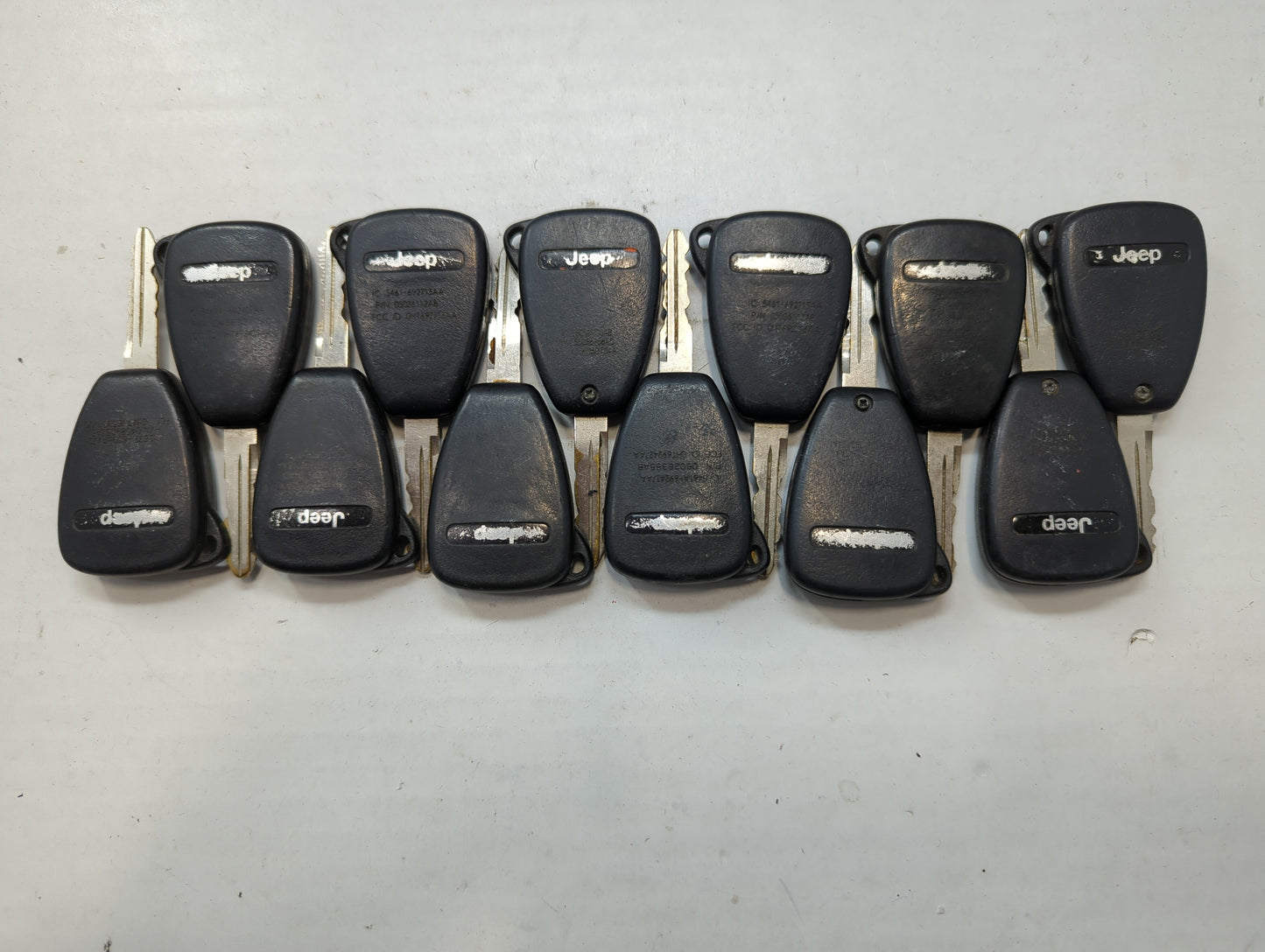 Lot of 12 Jeep Keyless Entry Remote Fob MIXED FCC IDS MIXED PART NUMBERS - Oemusedautoparts1.com
