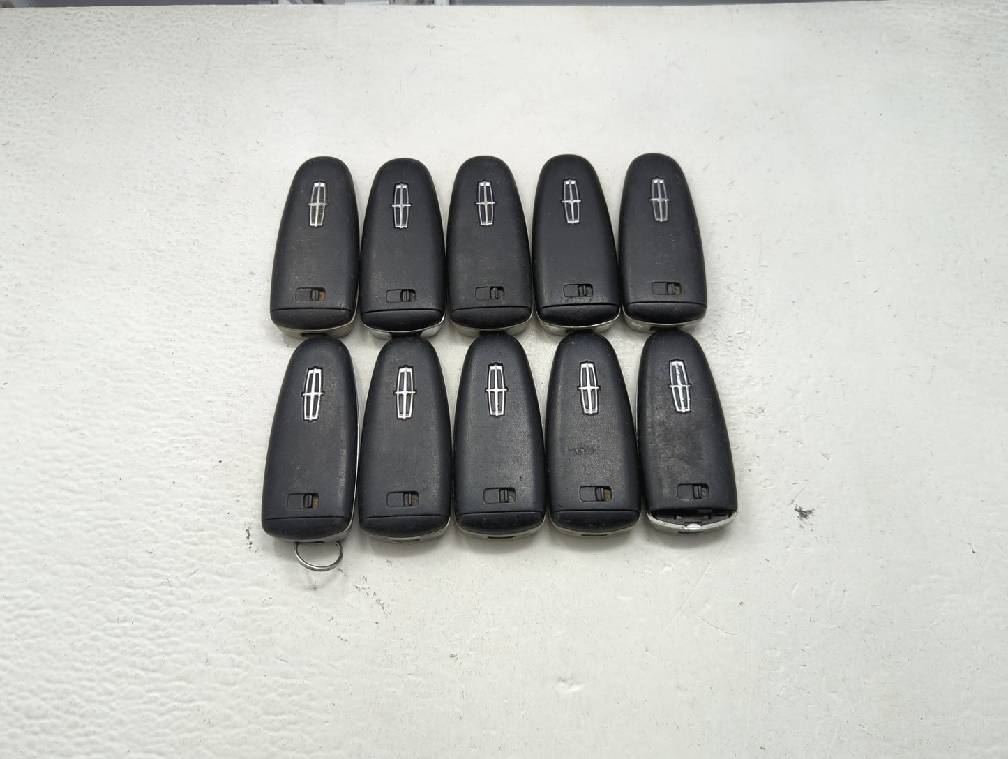 Lot of 10 Lincoln Keyless Entry Remote Fob M3N5WY8609 MIXED PART NUMBERS - Oemusedautoparts1.com