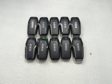 Lot of 10 Lincoln Keyless Entry Remote Fob MIXED FCC IDS MIXED PART 1476368