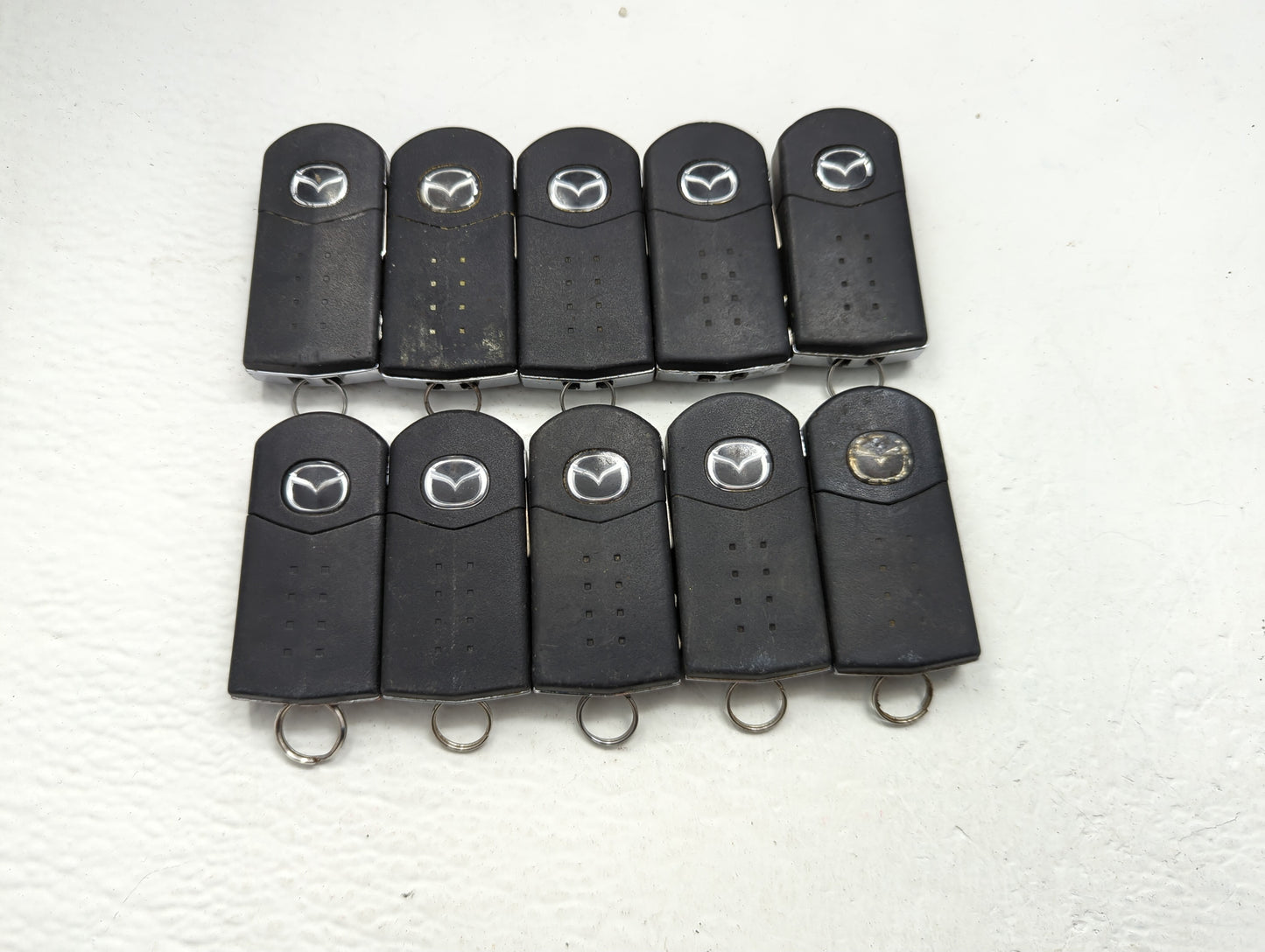 Lot of 10 Mazda Keyless Entry Remote Fob MIXED FCC IDS MIXED PART - Oemusedautoparts1.com
