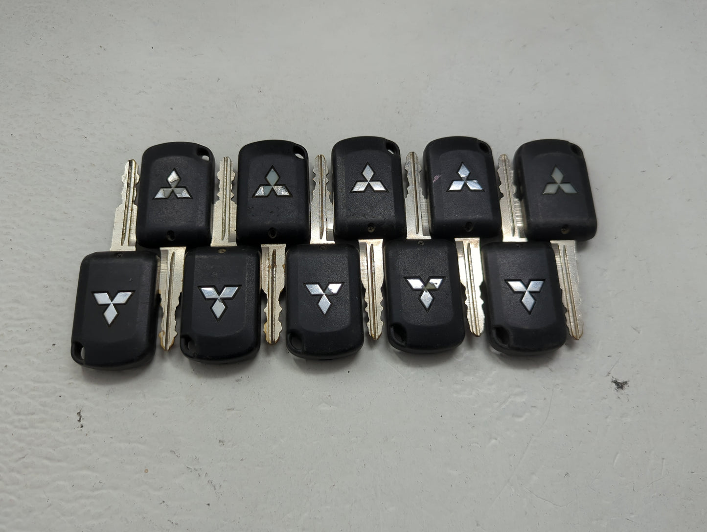 Lot of 10 Mitsubishi Keyless Entry Remote Fob MIXED FCC IDS 1474203 - Oemusedautoparts1.com