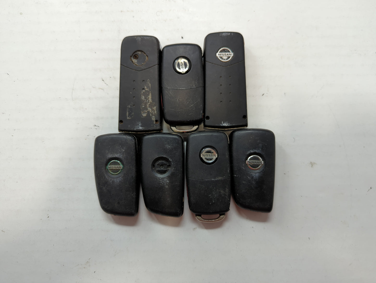 Lot of 7 Nissan Keyless Entry Remote Fob CWTWB1G767 - Oemusedautoparts1.com