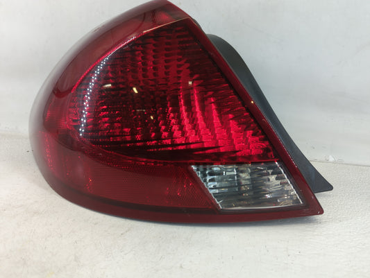 2000-2003 Ford Taurus Tail Light Assembly Driver Left OEM P/N:YF1X-13B505-A Fits Fits 2000 2001 2002 2003 OEM Used Auto Parts
