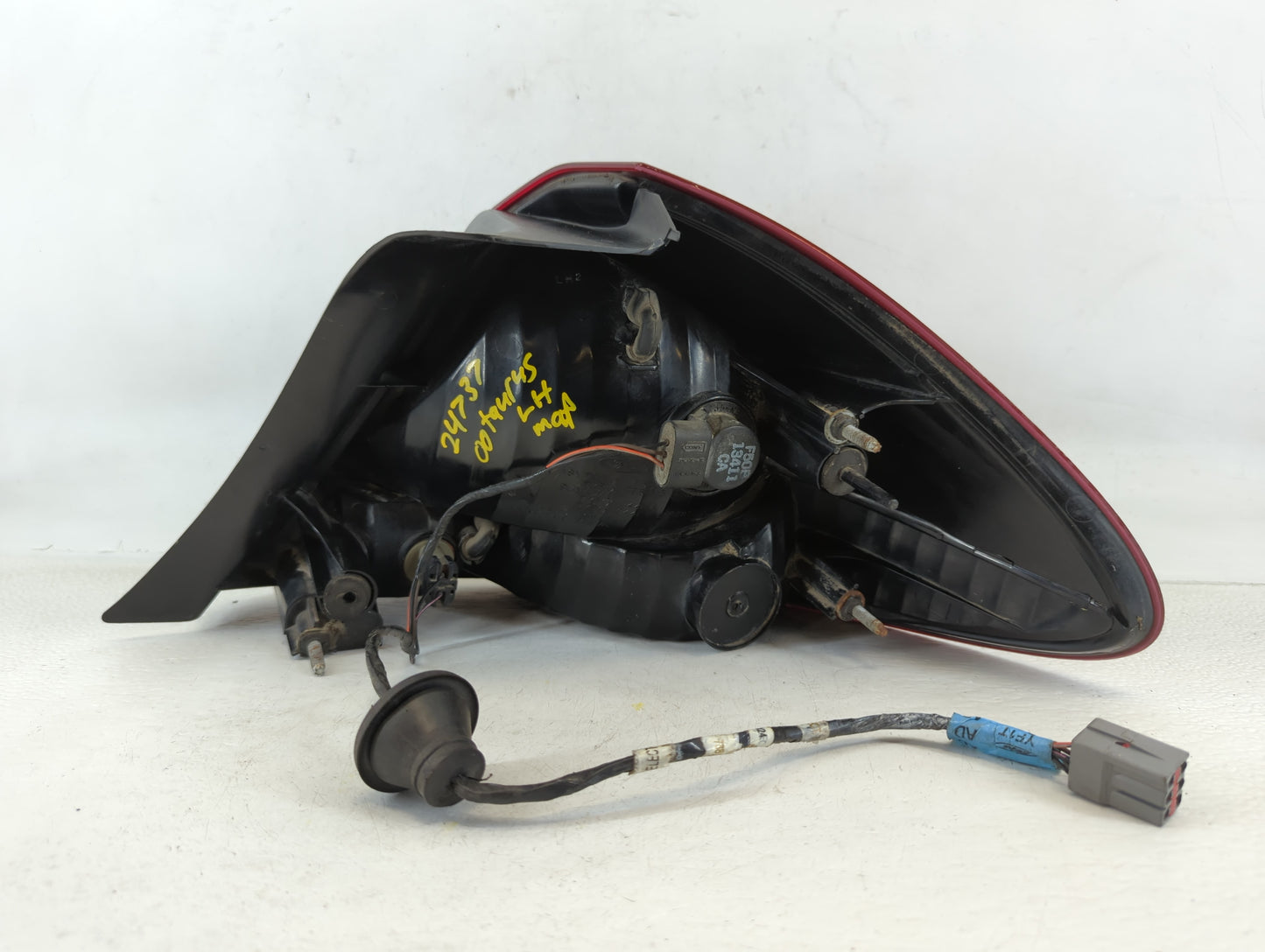 2000-2003 Ford Taurus Tail Light Assembly Driver Left OEM P/N:YF1X-13B505-A Fits Fits 2000 2001 2002 2003 OEM Used Auto Part