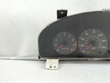 2000 Mazda 626 Instrument Cluster Speedometer Gauges P/N:69218-240A Miles: Fits OEM Used Auto Parts