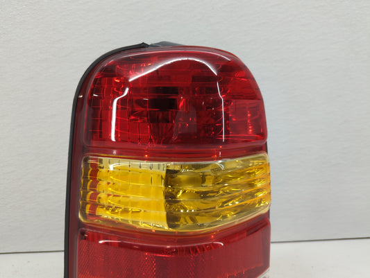 2001-2007 Ford Escape Tail Light Assembly Driver Left OEM P/N:4L84-13B505-D 1L84-13B505-D Fits OEM Used Auto Parts