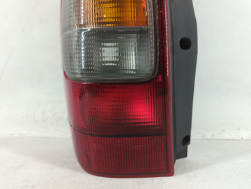 1999-2005 Pontiac Montana Tail Light Assembly Driver Left OEM P/N:10313113 10313115 Fits OEM Used Auto Parts